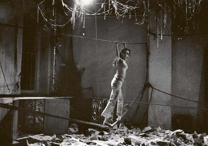 black and white photo of Carolee Schneemann performing Water Light / Water Needle