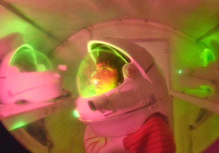 A woman in a space suit