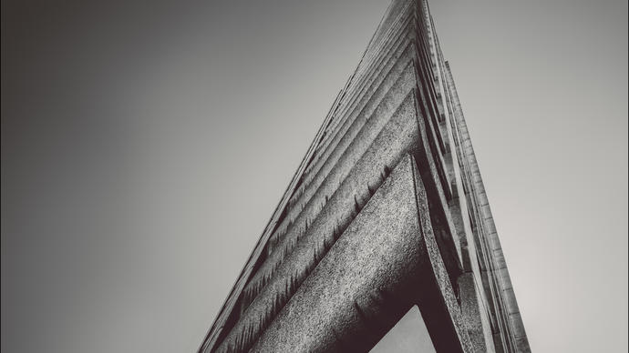 Photo of side view of Barbican Tower in black and white