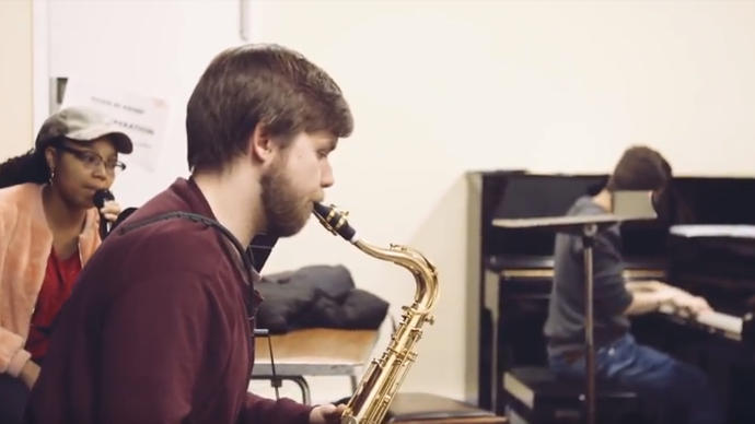 Photo of student playing saxophone