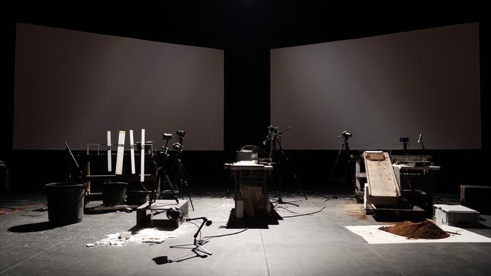 Wooden slats, slopes and piles of dirt on a stage