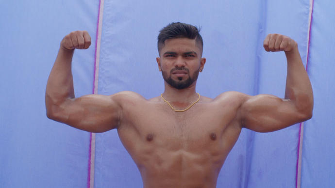 Muscle man posing