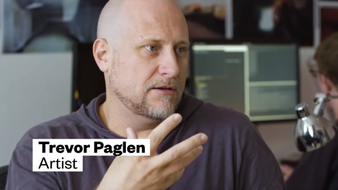 Photo of Trevor Paglen talking to the camera