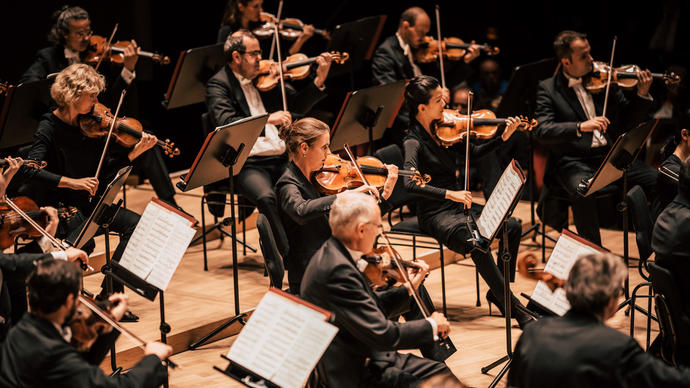 String players of the Gewandhausorchester Leipzig play their instruments on stage