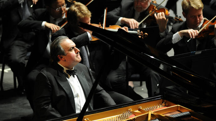 Pianist Yefim Bronfman performing on stage