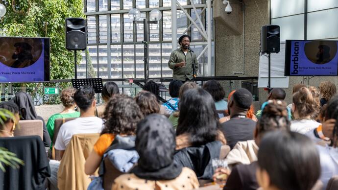 Person on stage in front of audience