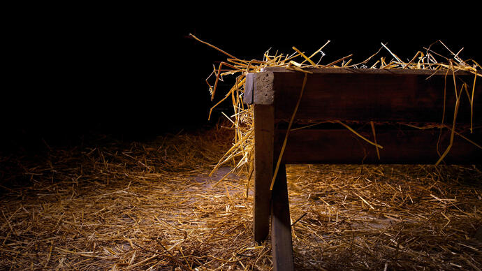 a manger in a dark room