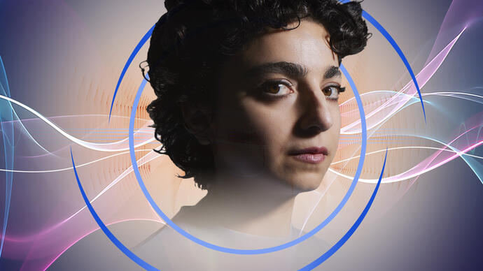 A headshot of Shiva Feshareki, with circular blue swirls around her. In the background are pink and white wavy shapes suggestive of soundwaves.