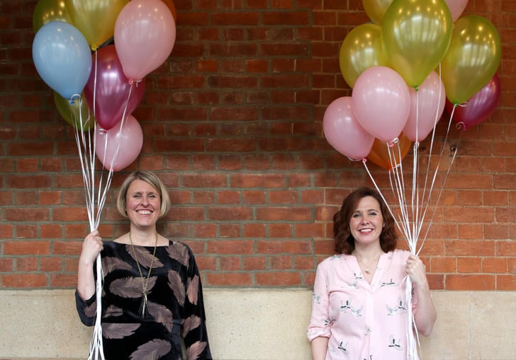 Two women with balloons