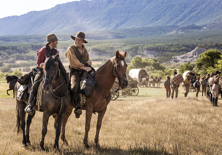 John C Reilly and Joaquin Phoenix on horseback