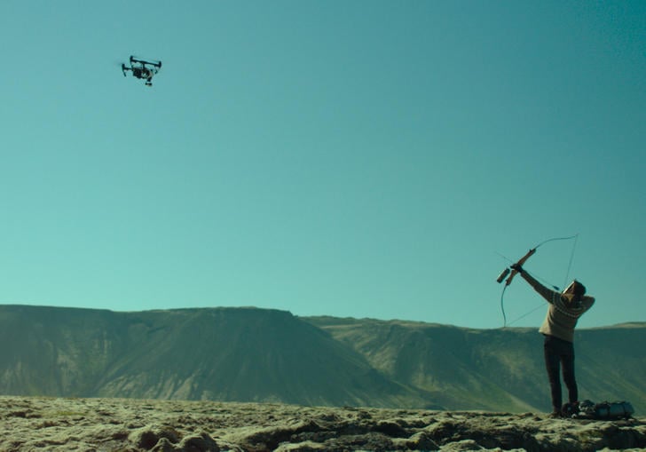 Woman At War's protagonist aims her crossbow at a drone