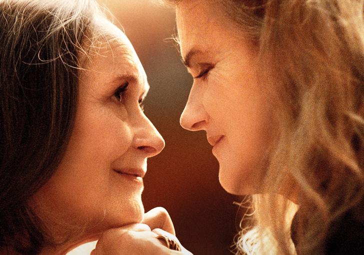 Barbara Sukowa and Martine Chevallier look lovingly into each other's eyes in a still from the film Two of Us