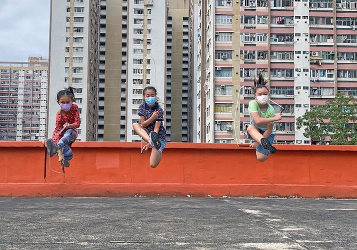 image of children playing jump rope