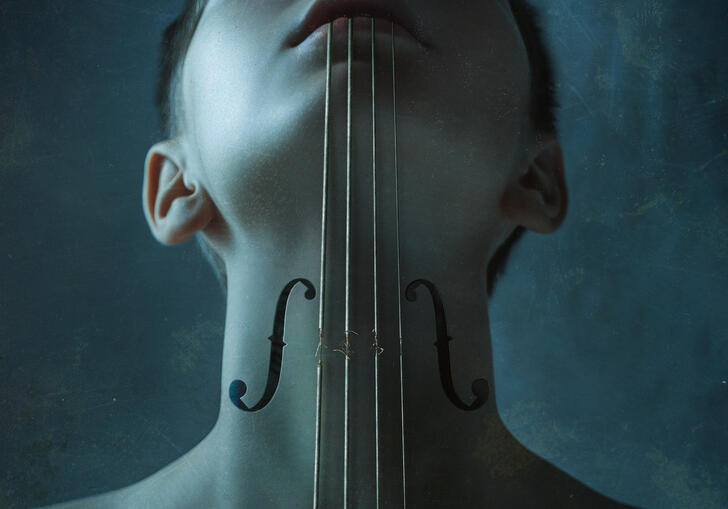 A person with cello holes in their neck looks upwards as four strings pull down their throat from their mouth.