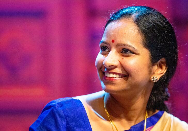 Jayanthi Kumaresh smiling while looking to her right