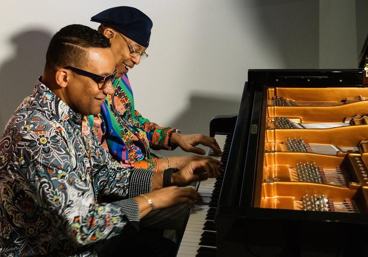 Chucho and Gonzalo playing the piano