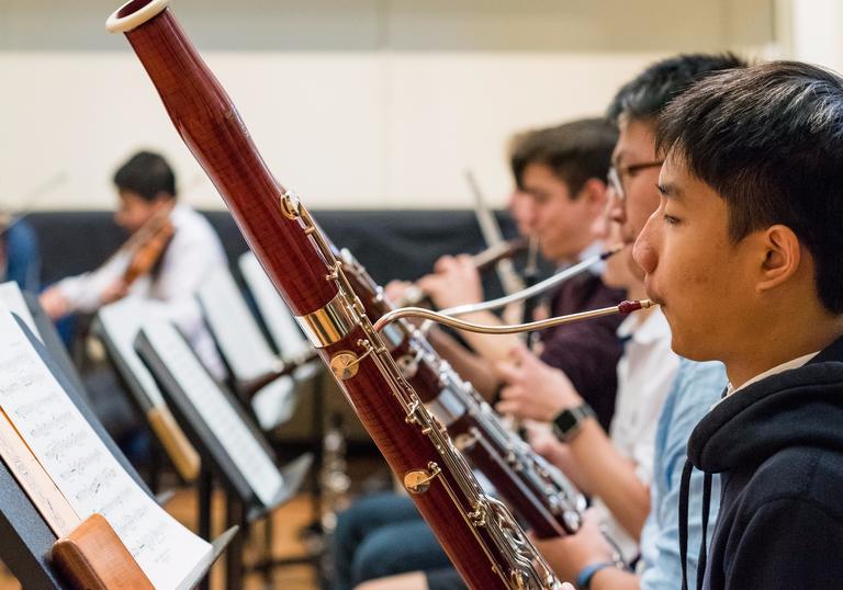 Winchester College student playing the bassoon