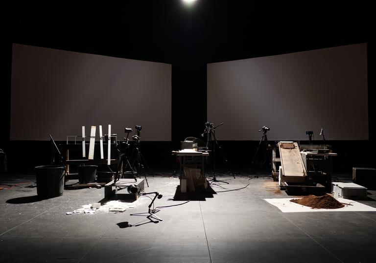 Wooden slats, slopes and piles of dirt on a stage