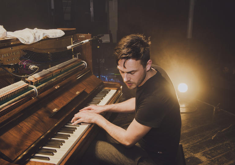 Pieter de Graaf playing a piano