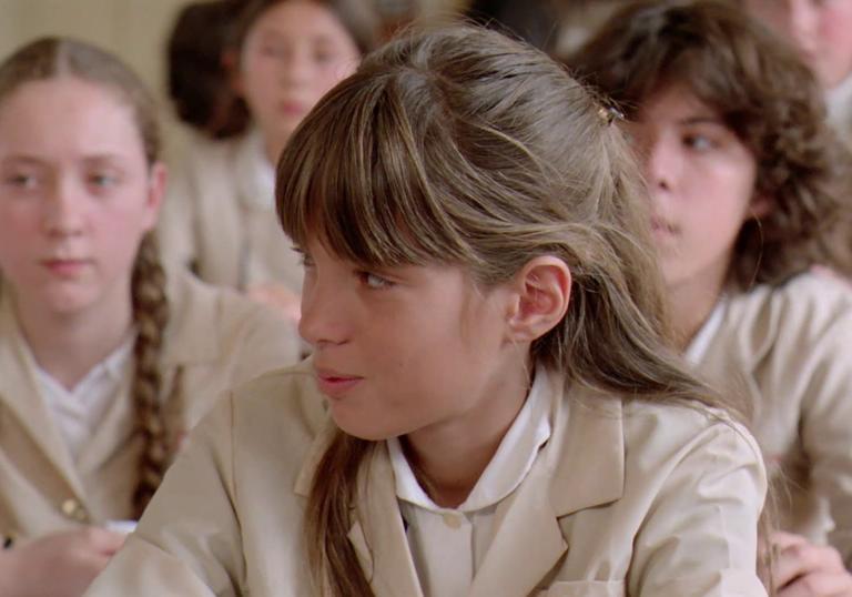 A young girl in school