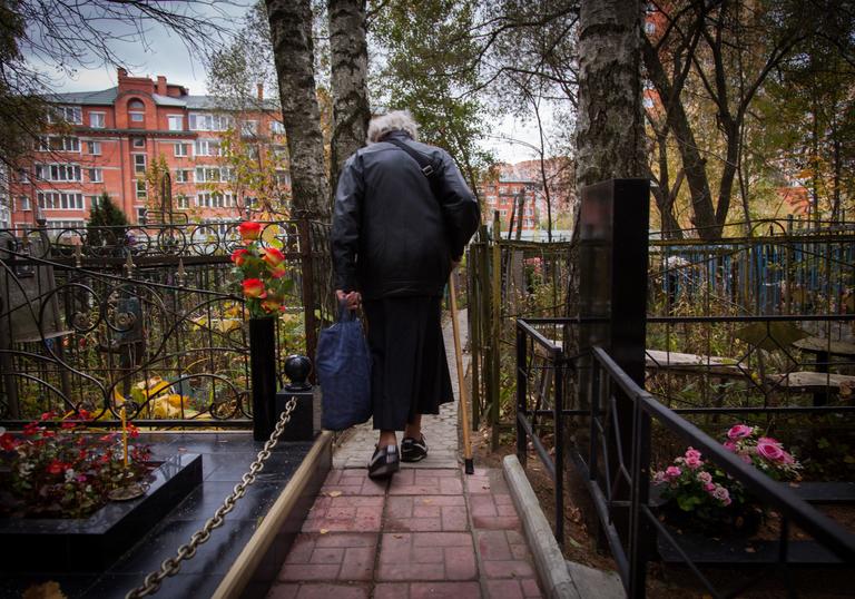 one of the women in the documentary walk through a park