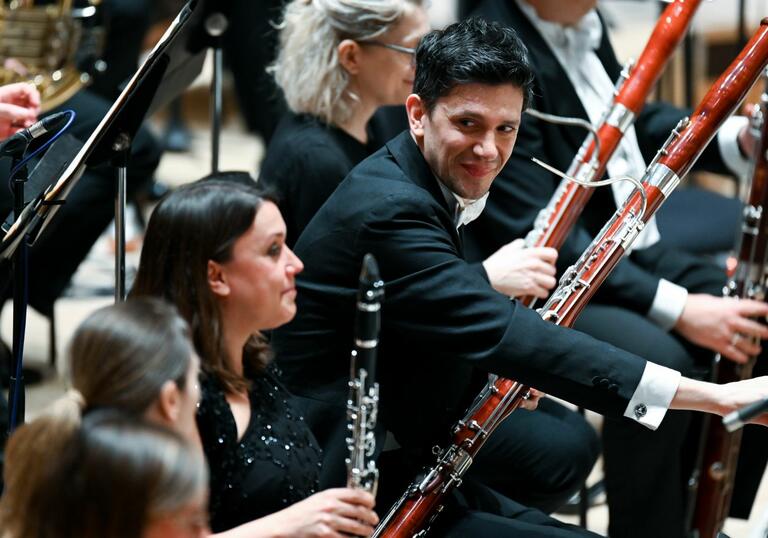 The woodwind section of the Royal Philharmonic Orchestra on stage