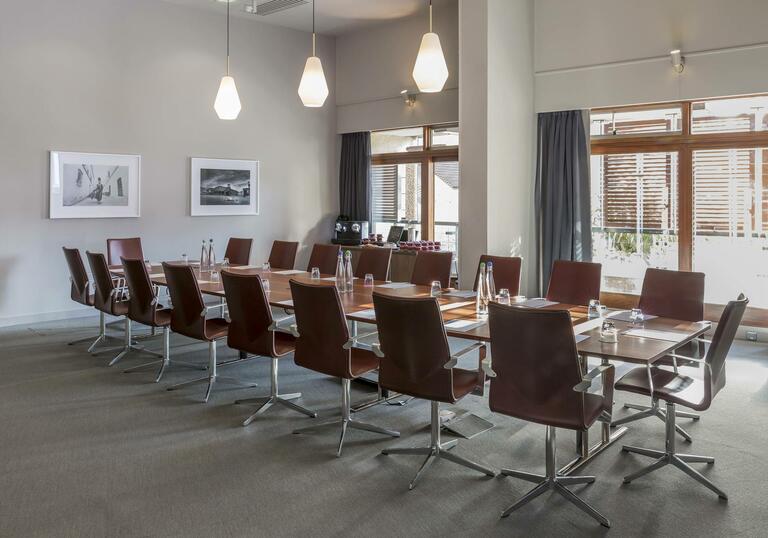 Frobisher boardroom set up with table & chairs