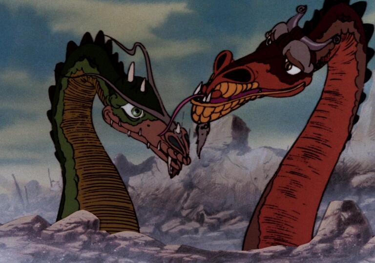 Two colourful dragons pop their heads over rocks in a mountainous landscape.