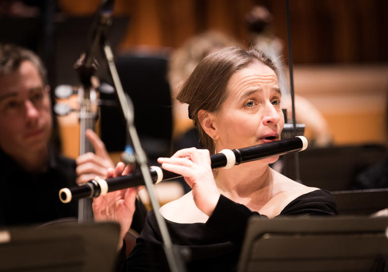 Photo of woman playing the flute