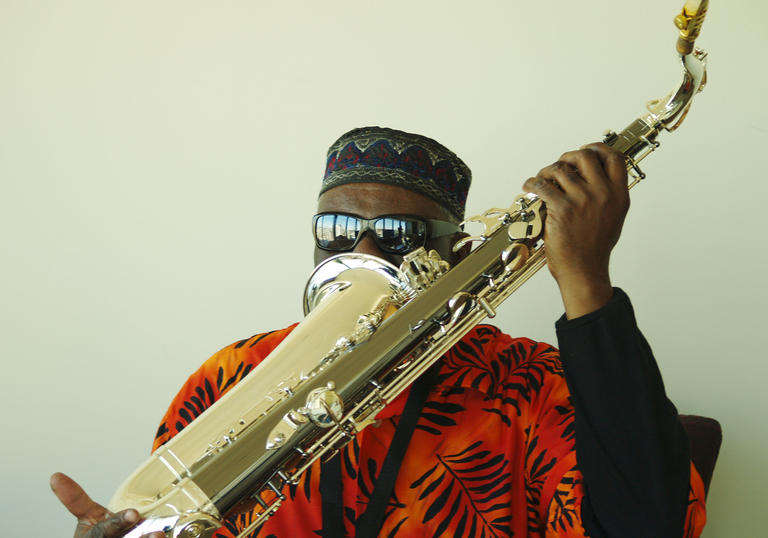 Pharoah Sanders having an intimate conversation with his saxophone