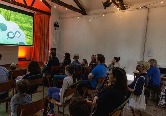 People sat down watching film