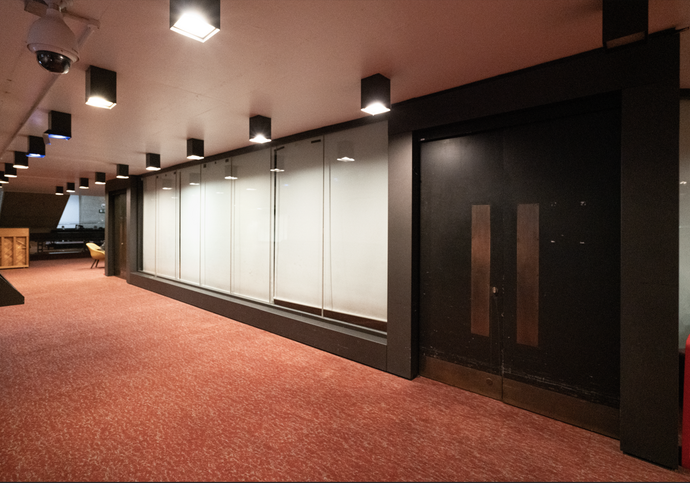 An empty foyer outside of the Fountain Room shows space being underused