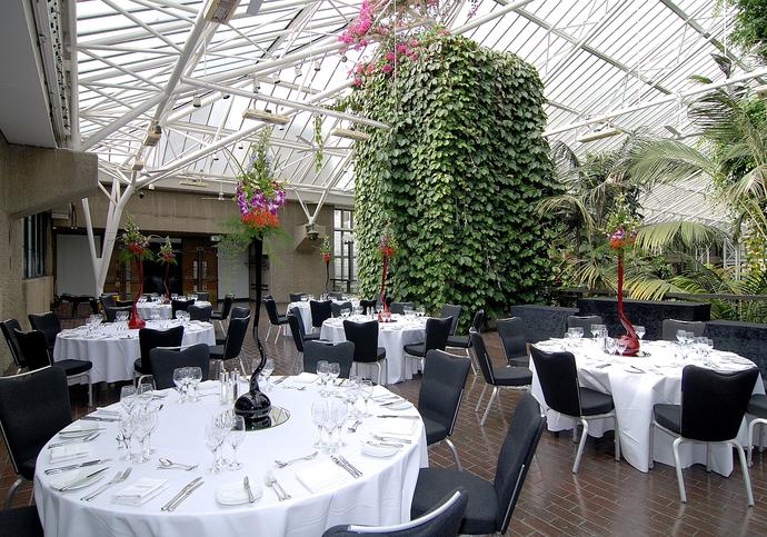 Photo of the Barbican Conservatory Terrace laid out with tables