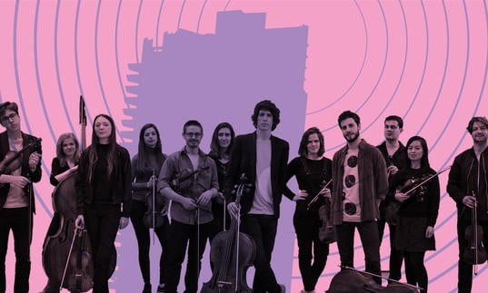 12 Ensemble with their string instruments, standing in front of the Barbican tower with radio broadcast waves emitting