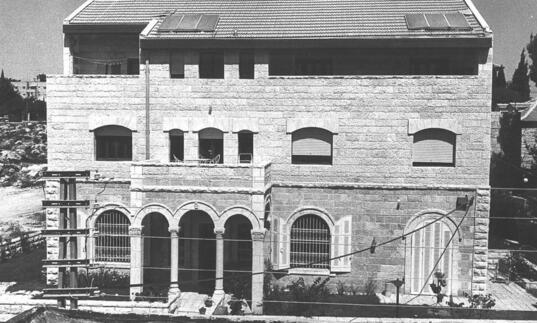 A black and white picture of a house in Jerusalem.