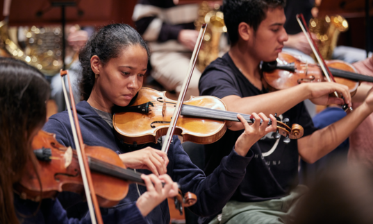 Junior Guildhall violinists performing