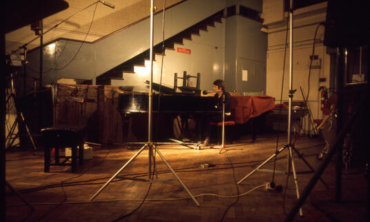 Paul McCartney sits in Abbey Road studios. 