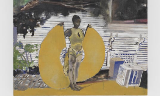 A painting of Davis's wife Karon, holding two golden wings at her sides, reminiscent of a winged goddess. She is in front of the grey wooden wall of the house, and the branches of tree looming over her. By her side there's a box and an old appliance.